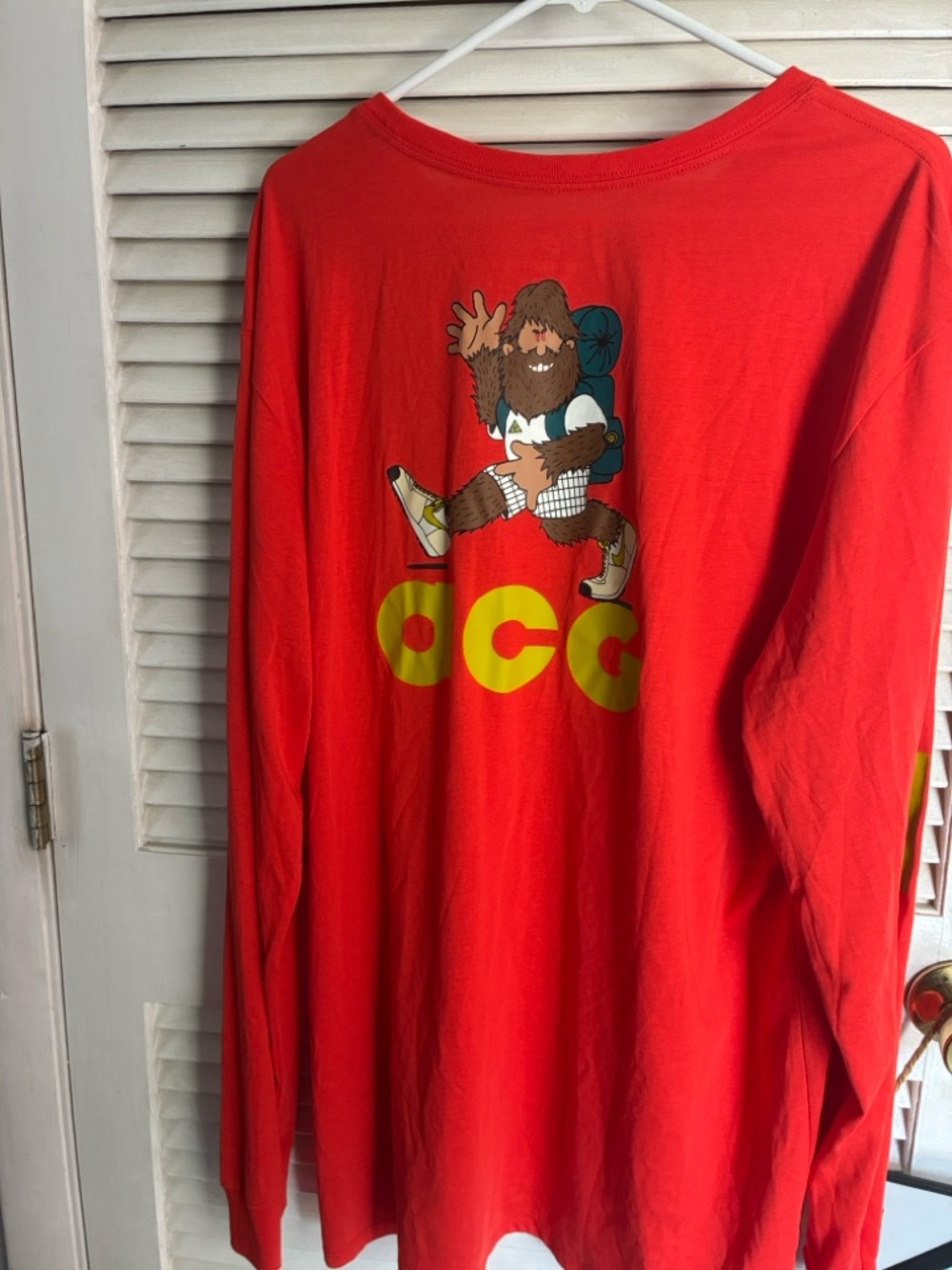Nike ACG “We Out There” Orange Red Long Sleeve ACG Tee with Yellow Logo